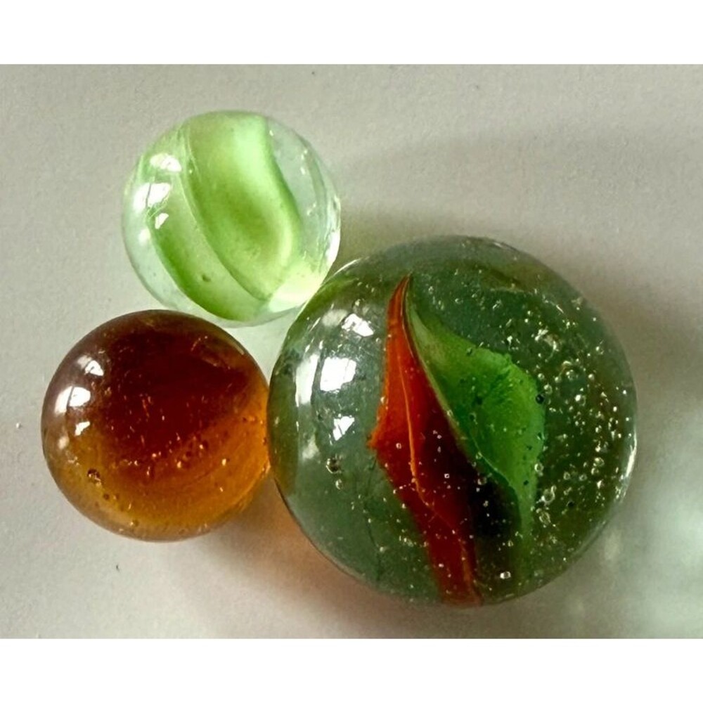 1 large and 2 small vintage glass marbles